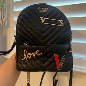 Mini back pack victorious secret.